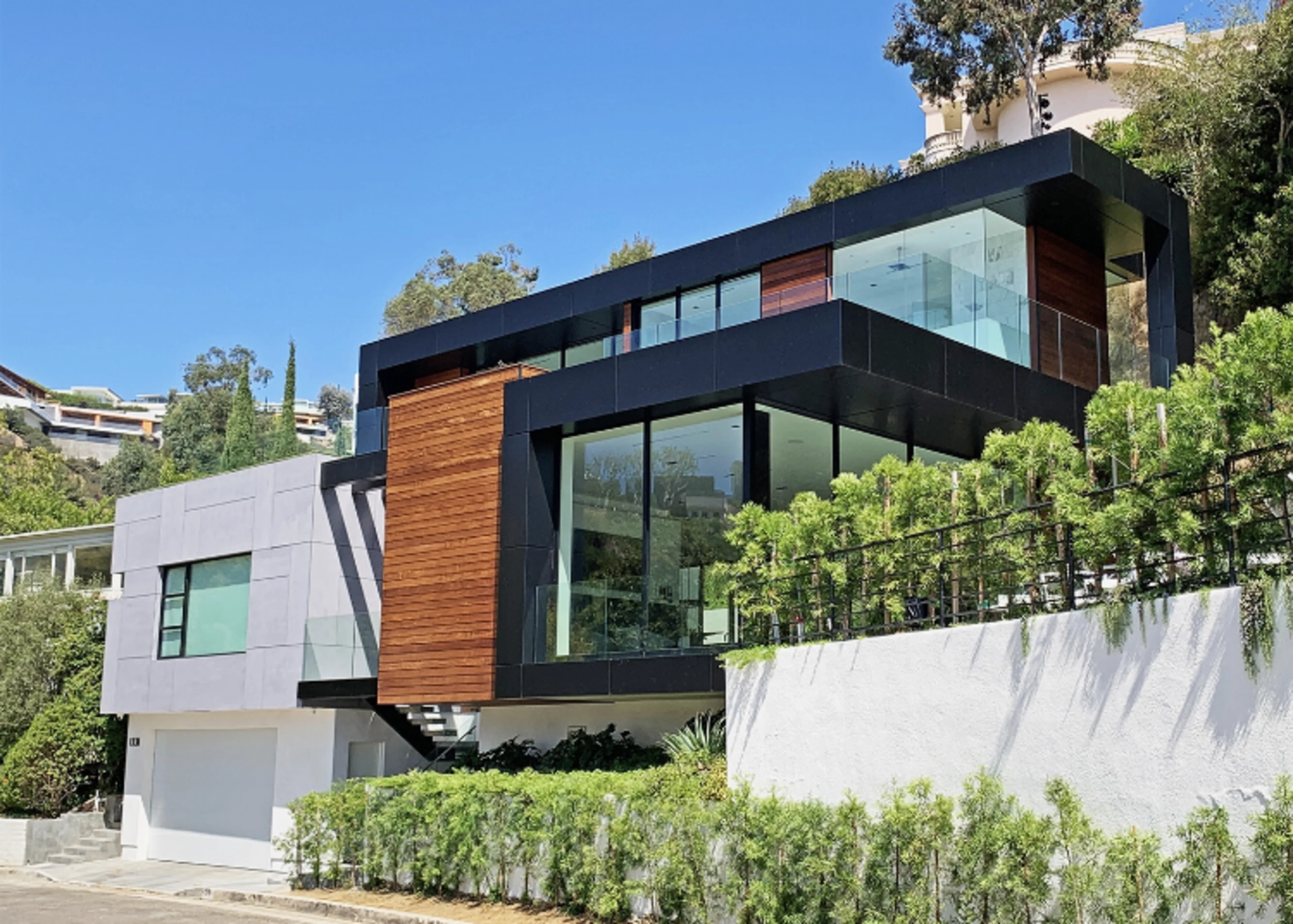 Modern black luxury home on Beverly Hills hillside